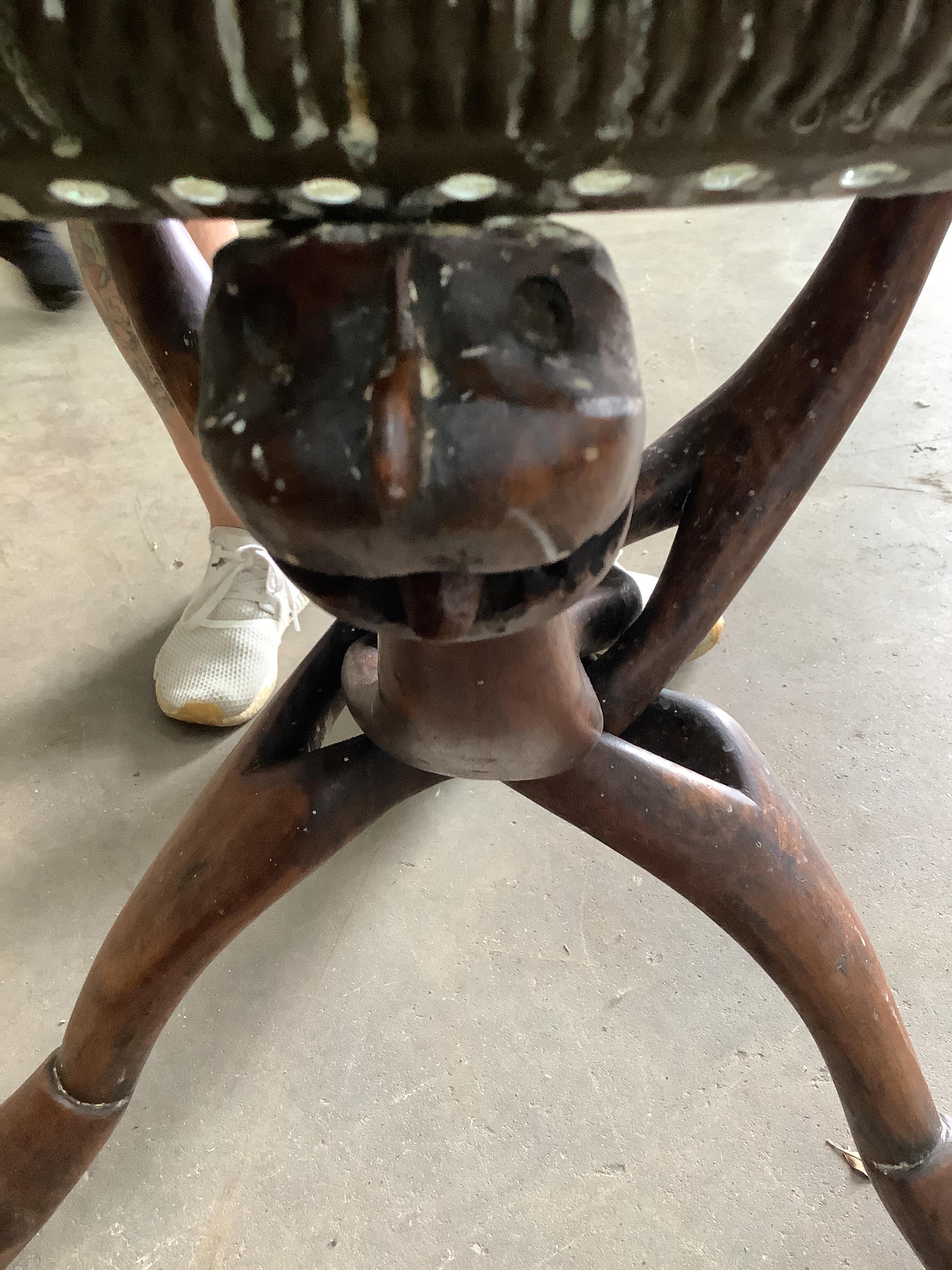 An Indian circular pierced brass tray top occasional table, diameter 69cm, height 65cm